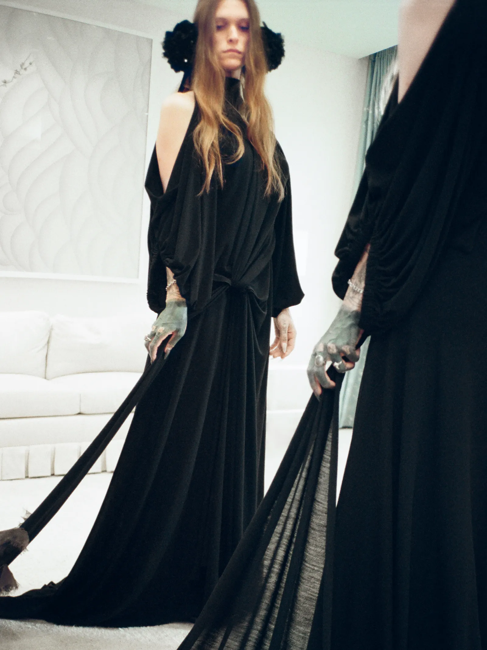 Image may contain Clothing Dress Fashion Adult Person Formal Wear Evening Dress and Gown