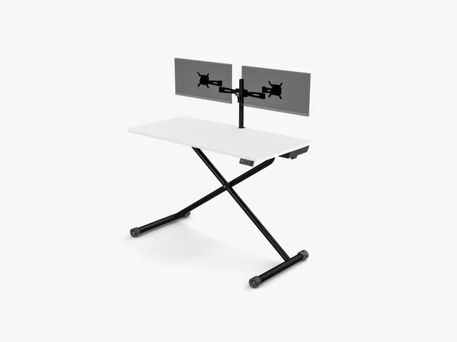 Lillipad Foldable Electric Standing Desk with white top and black legs a metal extension attached to the back for two...
