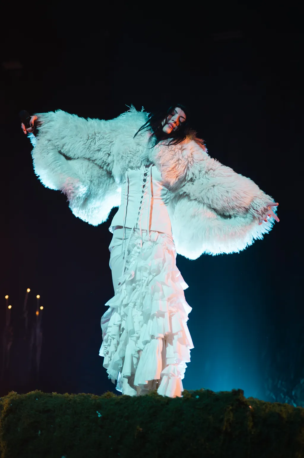 Image may contain Clothing Dress Adult Person Formal Wear Costume Art Fashion Gown Performer and Solo Performance