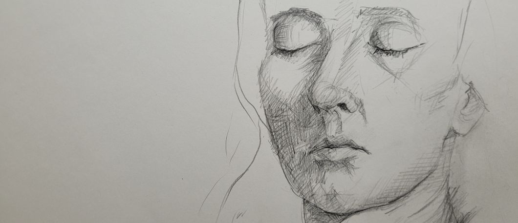 A pencil sketch of a female-presenting human face, with their eyes closed