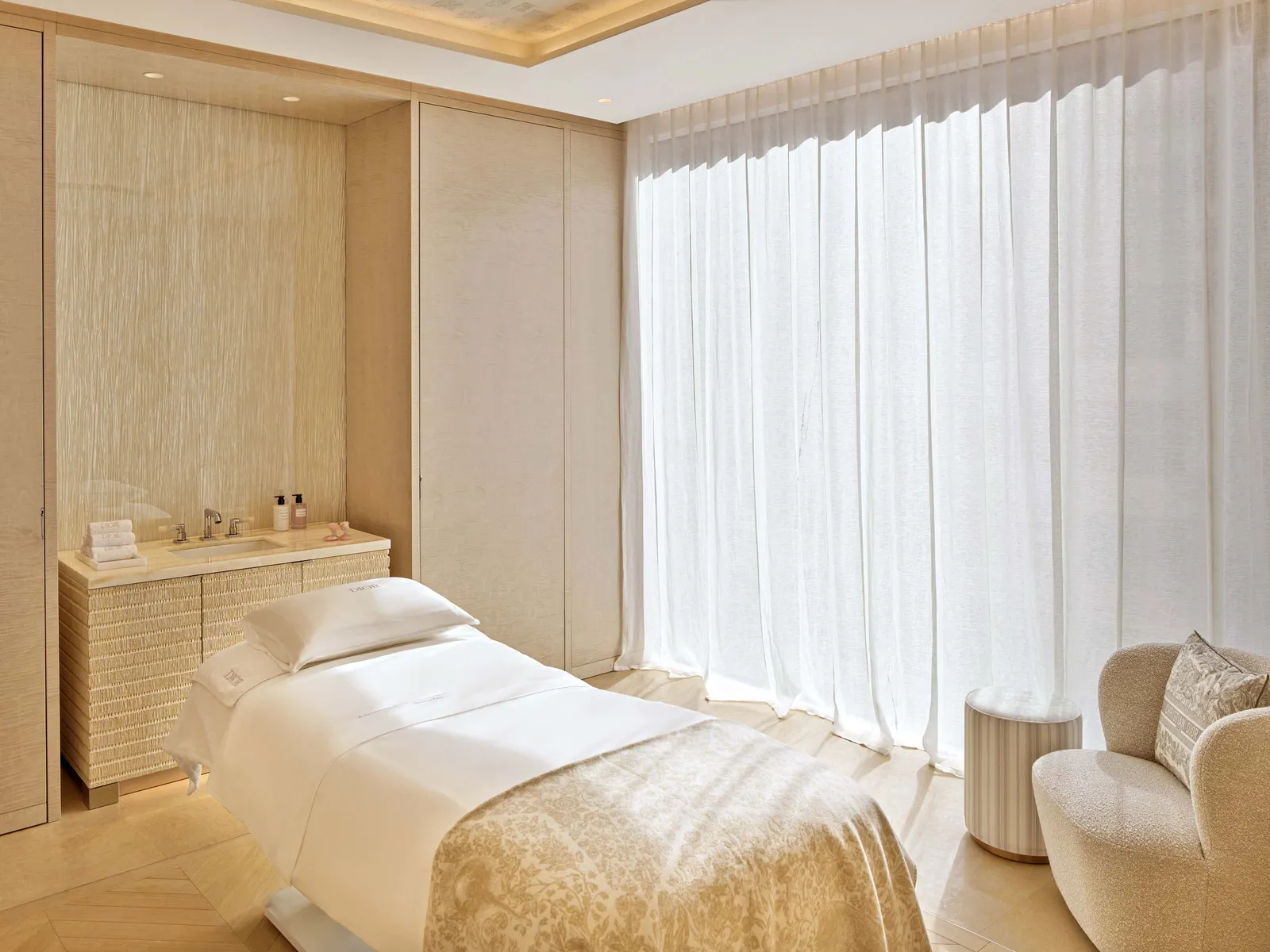 Image may contain Indoors Interior Design Home Decor Bed Furniture and Spa