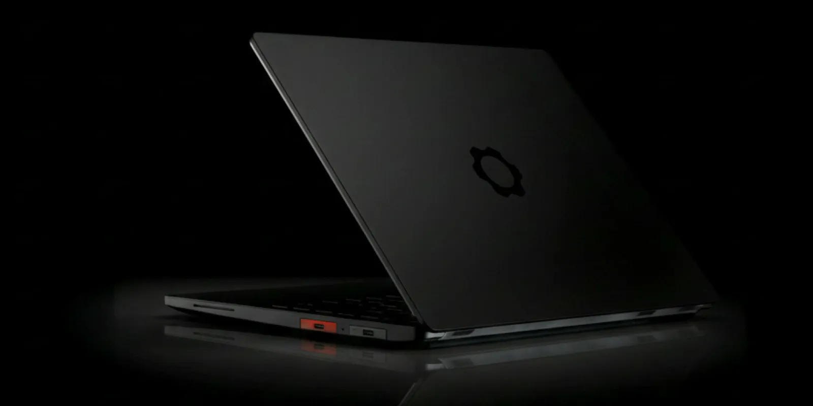 Framework Laptop 13 Pro seen in a low-key photo