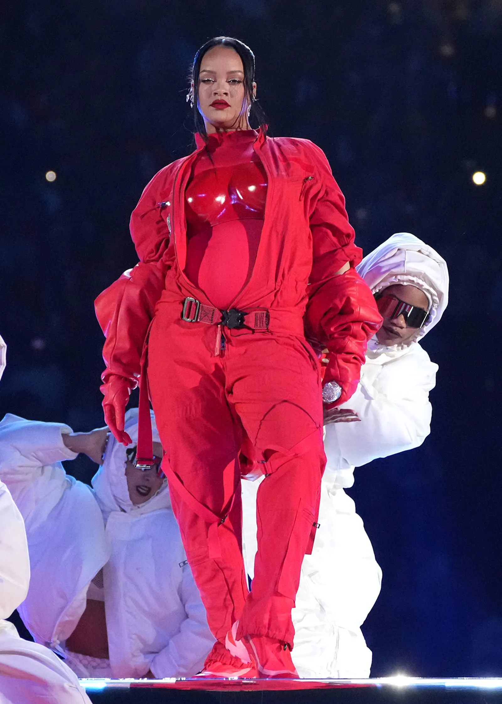 Image may contain Rihanna Performer Person Solo Performance Adult Dancing Leisure Activities Face Head and Baby
