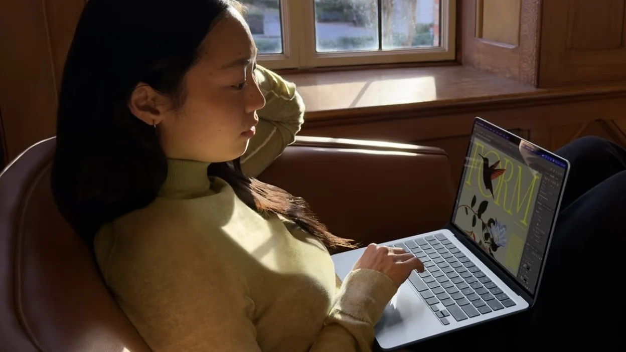 person working on m5 macbook air