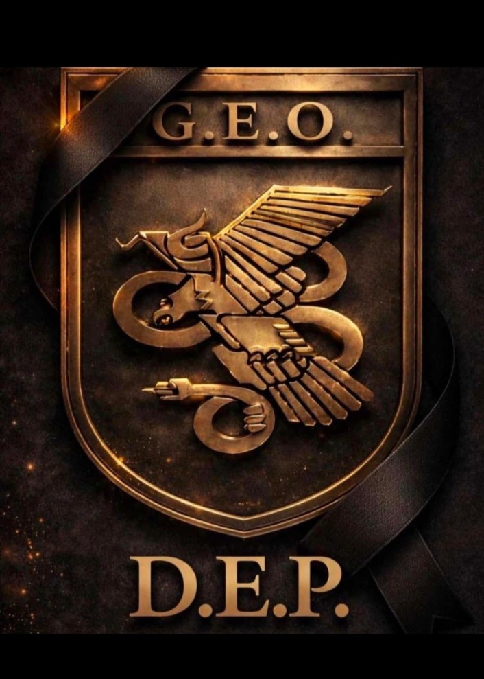 Un cresp�n negro en el escudo de los GEO compartido por varios polic�as tras el suceso.