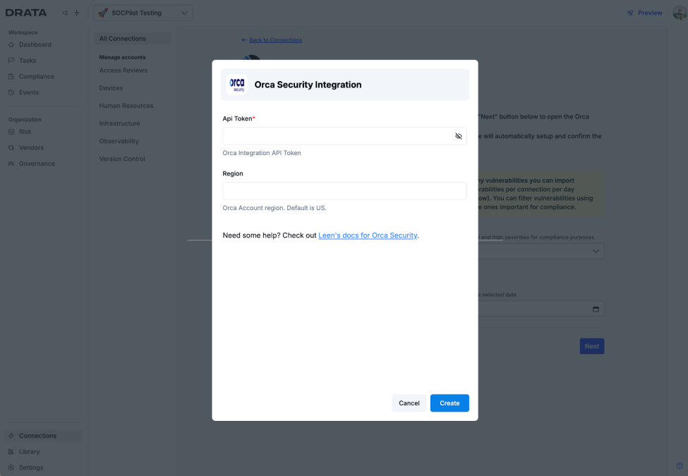 Screenshot of the Drata platform's Orca Security integration modal, requiring an API Token and Region to establish the connection.