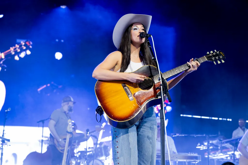 Image may contain Kacey Musgraves Guitar Musical Instrument Performer Person Solo Performance and Adult
