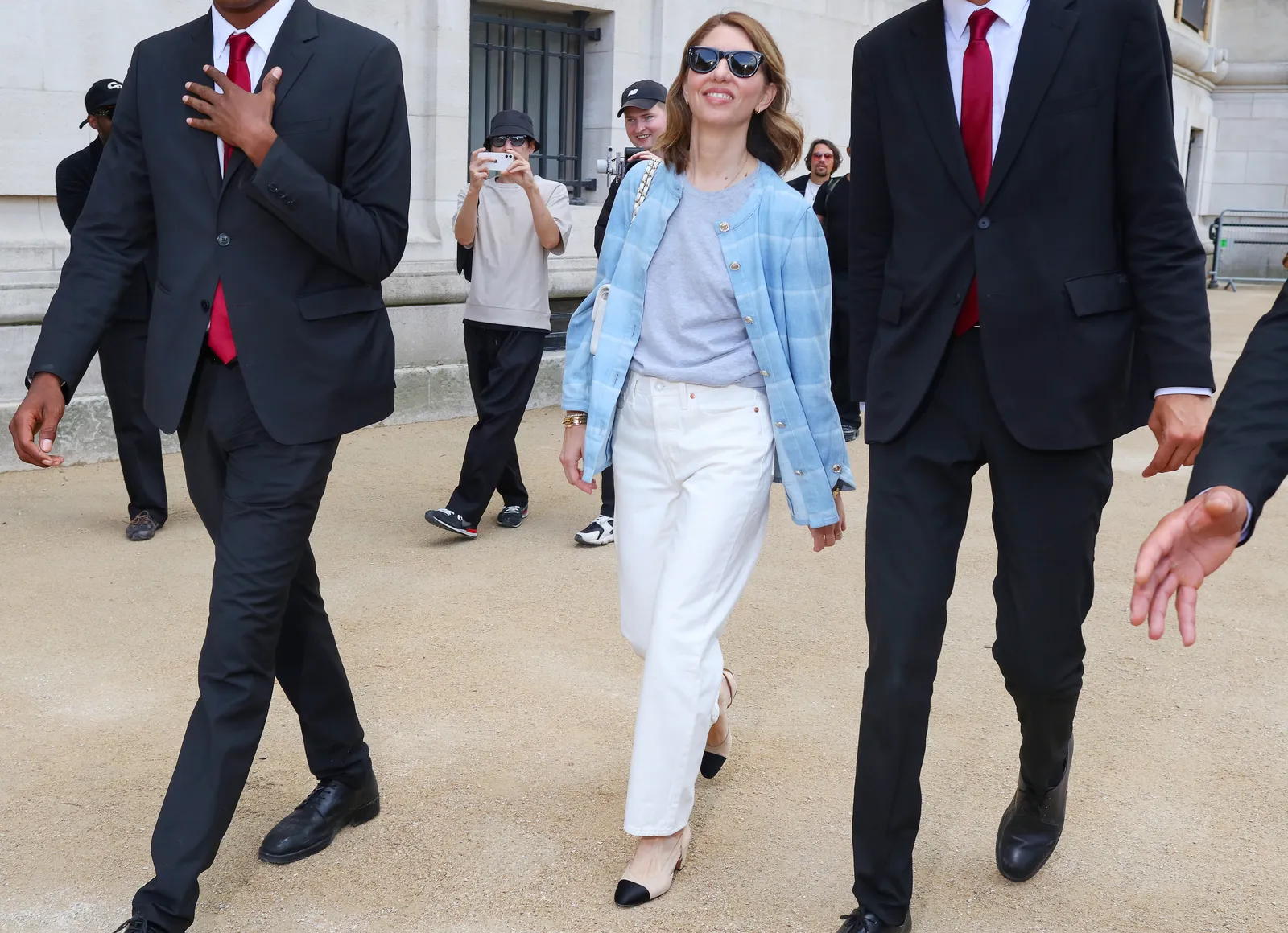 Image may contain Sofia Coppola Piotr Nowakowski Tommy Alverson Teddy Williams Blazer Clothing Coat and Jacket