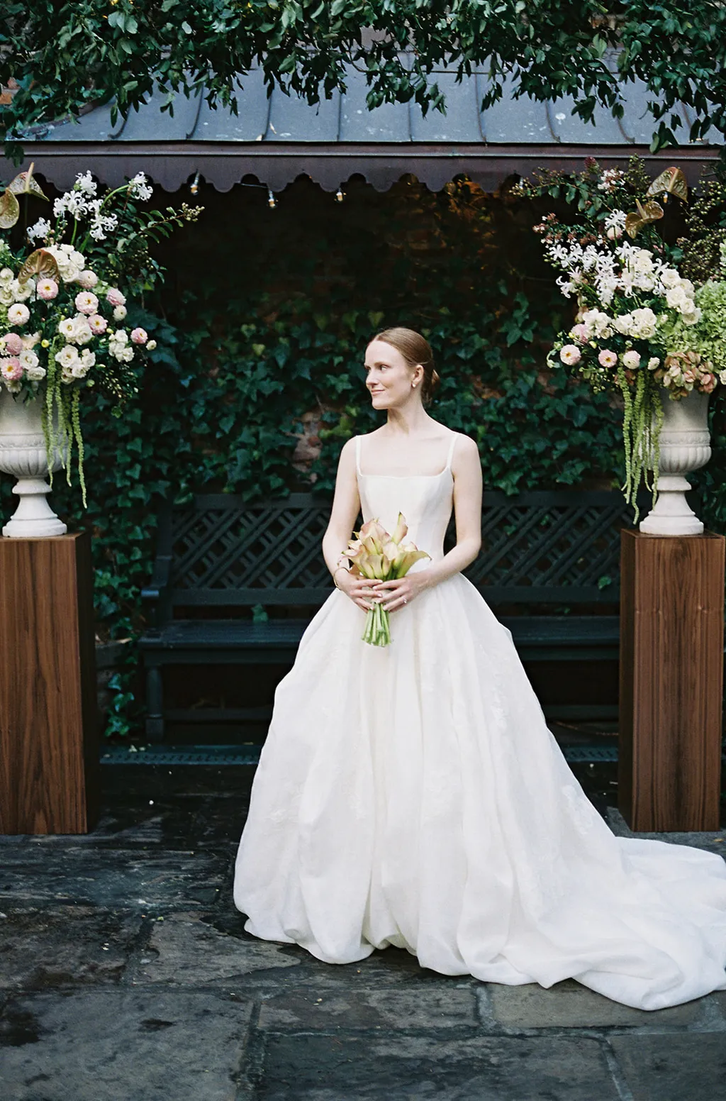 Image may contain Clothing Dress Fashion Formal Wear Gown Wedding Wedding Gown Adult Person and Standing