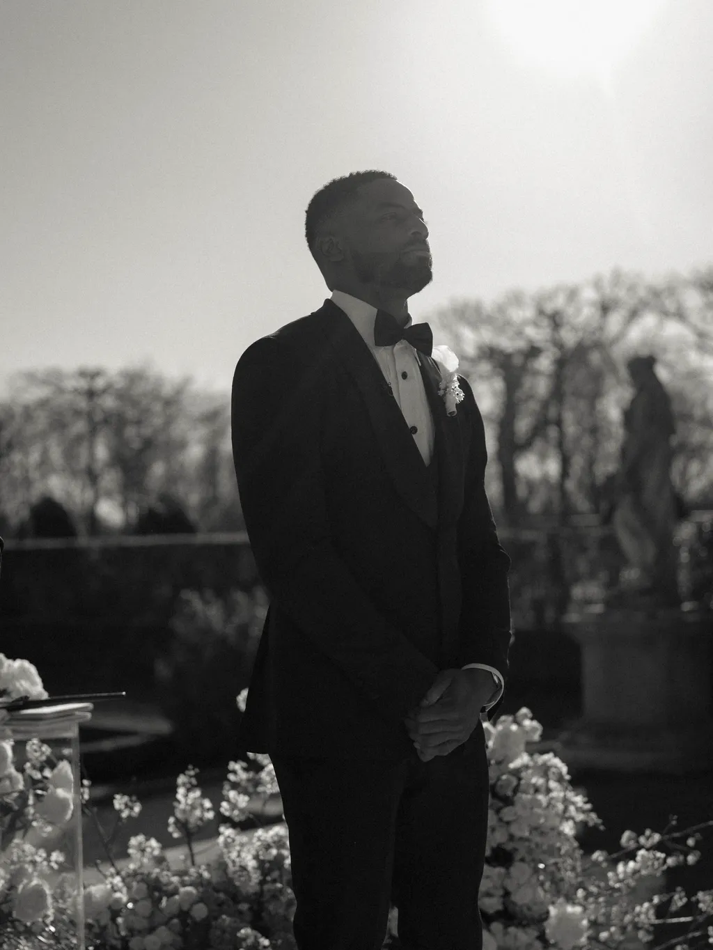Image may contain Clothing Formal Wear Suit Tuxedo Face Head Person Photography Portrait Coat Blazer and Jacket