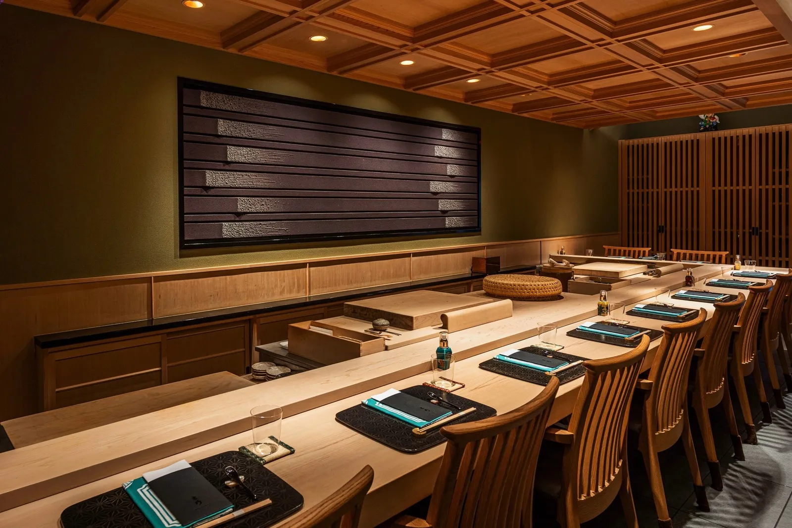 Image may contain Indoors Interior Design People Person Chair Furniture Table Cutlery Spoon and Cup