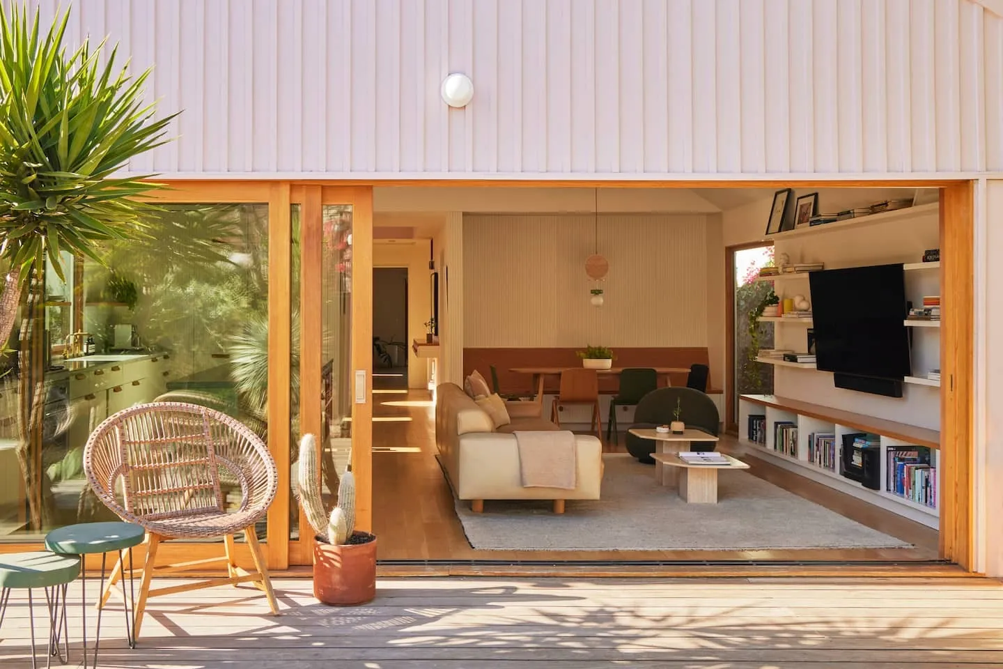 Image may contain Indoors Interior Design Chair Furniture Plant Home Decor Rug Architecture and Building