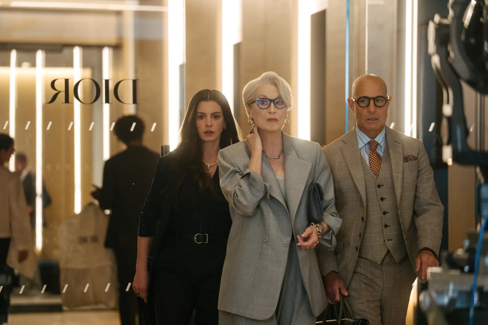 Image may contain Meryl Streep Anne Hathaway Blazer Clothing Coat Jacket Person Formal Wear Suit and Adult