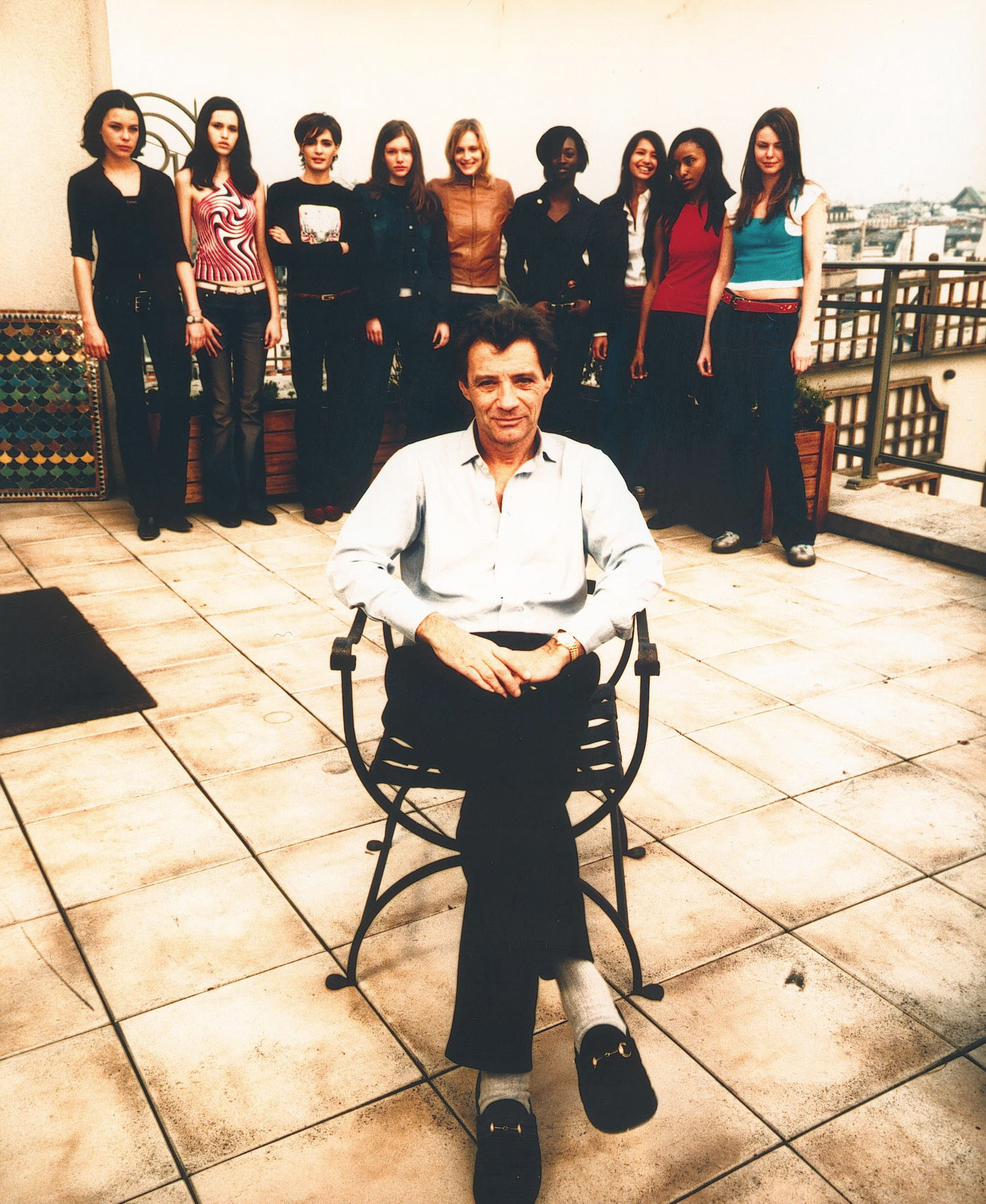 Jean -Luc Brunel, con varias modelos de su agencia Karin Models.