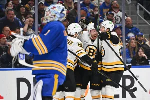 BUFFALO, NEW YORK - APRIL 19: Morgan Geekie #39 of the Boston Bruins celebrates his goal with teammates during the first period in Game One of the First Round of the 2026 Stanley Cup Playoffs against the Buffalo Sabres at KeyBank Center on April 19, 2026 in Buffalo, New York. (Photo by Joe Hrycych/Getty Images)