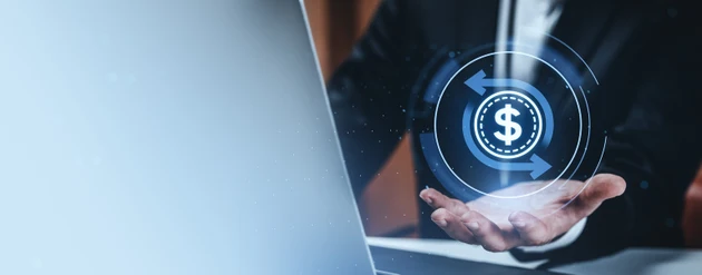 Digital money transfer symbol floating above a businessperson open hand beside a laptop on a light gradient background demonstrating finance technology.