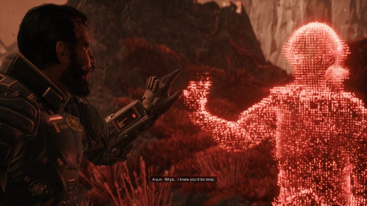 A character in 'Lords of the Fallen' reaches towards a holographic figure in a red digital landscape, with on-screen text stating, 'Arjun: Nitya... I knew you'd be okay.'