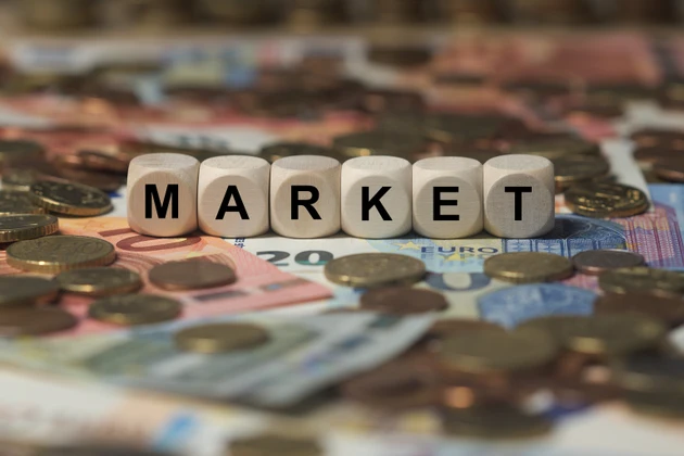 market - cube with letters, money sector terms - sign with wooden cubes