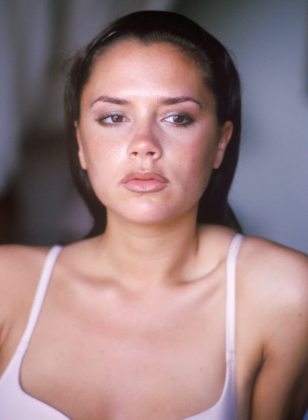 Image may contain Victoria Beckham Head Person Face Photography Portrait Body Part Neck Adult and Shoulder. Victoria Beckham