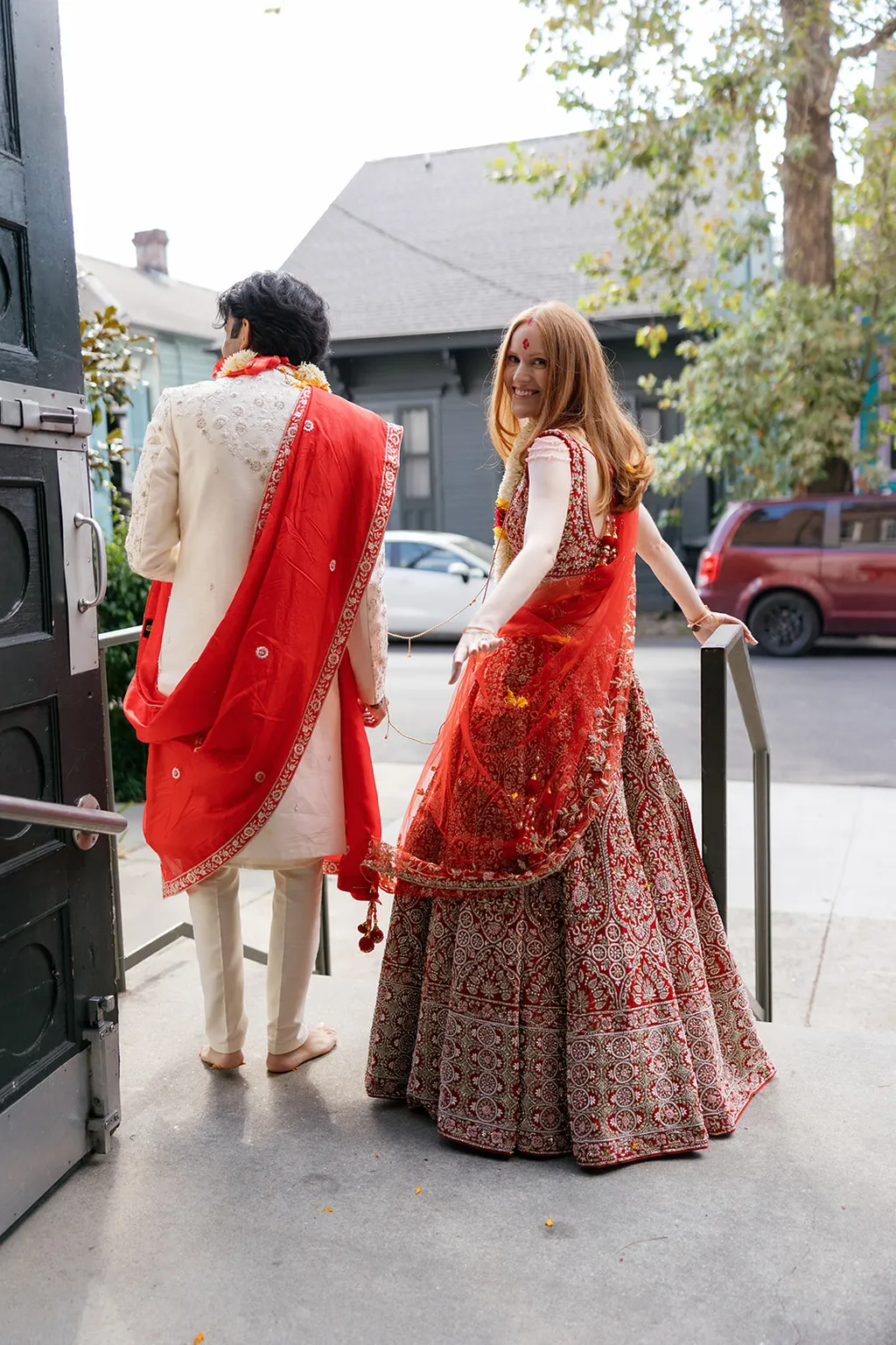Image may contain Body Part Hand Person Holding Hands Adult Wedding Clothing and Coat