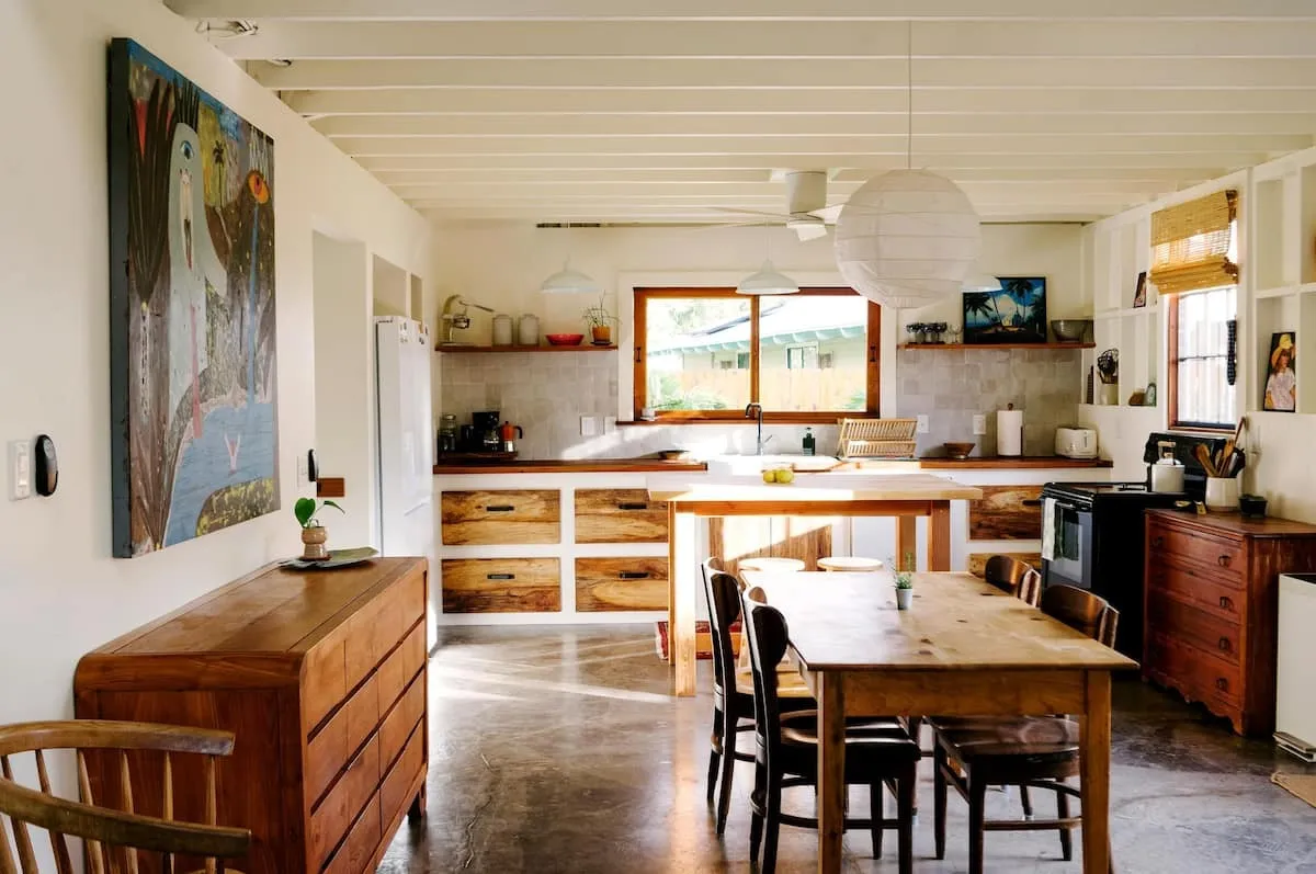 Image may contain Indoors Interior Design Architecture Building Dining Room Dining Table Furniture Room and Table