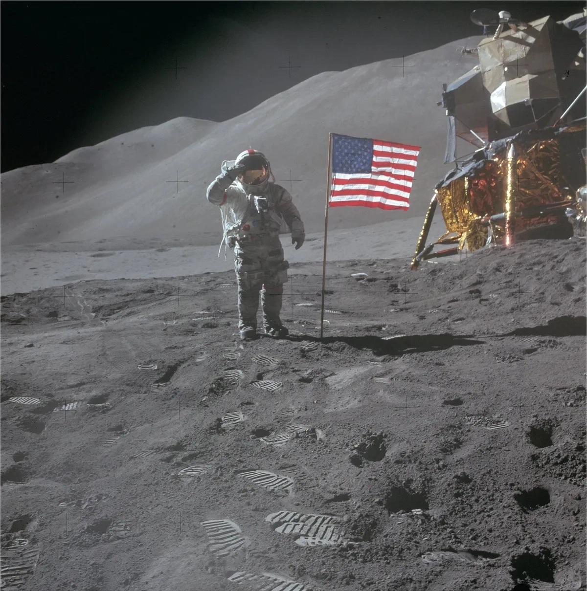 U.S. Astronaut David Scott salutes the American flag during 1971 Apollo mission. Photo courtesy of NASA