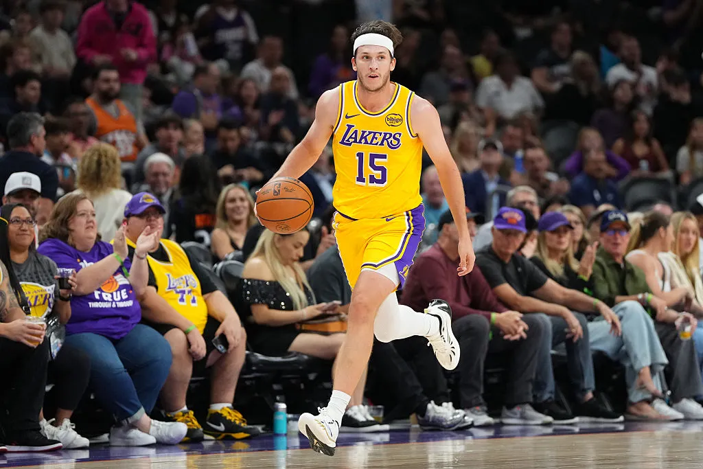 PHOENIX, ARIZONA - OCTOBER 14: Austin Reaves #15 of the Los Angeles Lakers controls the ball against the Phoenix Suns during the first half of the NBA game at Mortgage Matchup Center on October 14, 2025 in Phoenix, Arizona. NOTE TO USER: User expressly acknowledges and agrees that, by downloading and or using this photograph, User is consenting to the terms and conditions of the Getty Images License Agreement. (Photo by Kelsey Grant/Getty Images)