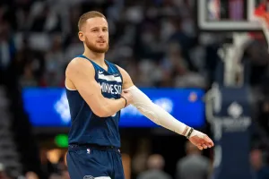 Oct 26, 2024; Minneapolis, Minnesota, USA; Minnesota Timberwolves guard Donte DiVincenzo (0) looks on against the Toronto Raptors in the first half at Target Center. Mandatory Credit: Jesse Johnson-Imagn Images