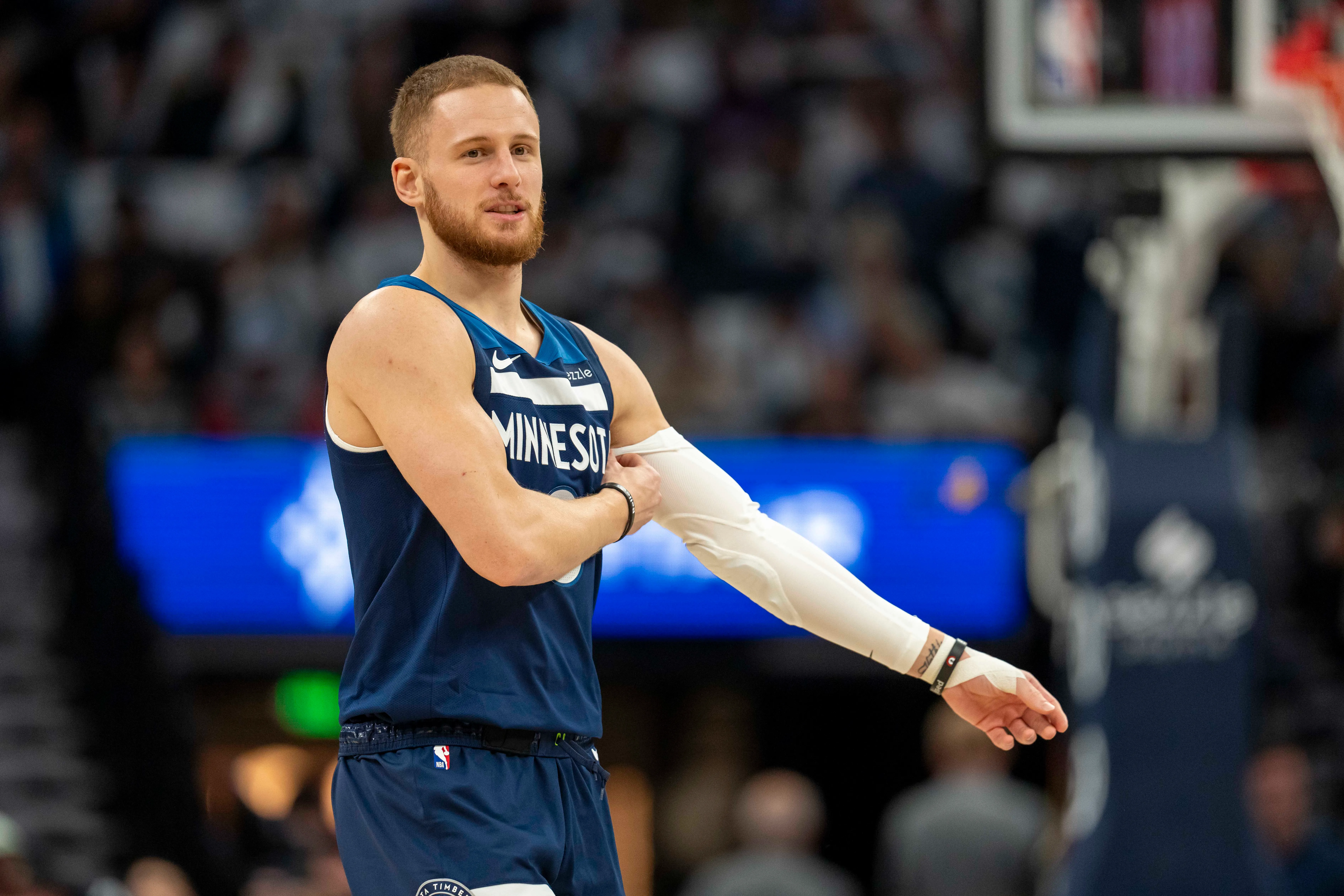 Oct 26, 2024; Minneapolis, Minnesota, USA; Minnesota Timberwolves guard Donte DiVincenzo (0) looks on against the Toronto Raptors in the first half at Target Center. Mandatory Credit: Jesse Johnson-Imagn Images