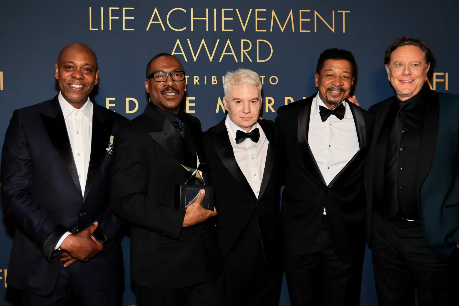 Dave Chappelle, Mike Myers, Robert Townsend and Judge Reinhold were on hand to support Eddie Murphy as he received the 51st AFI Life Achievement Award in Hollywood on Saturday.