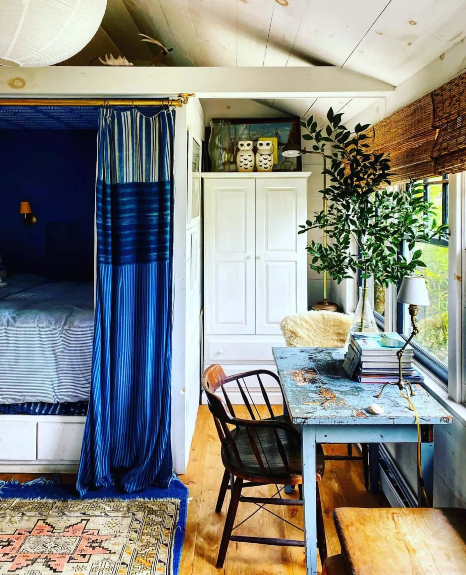 Image may contain Furniture Bed Bedroom Indoors Room Chair Home Decor Rug and Canopy Bed