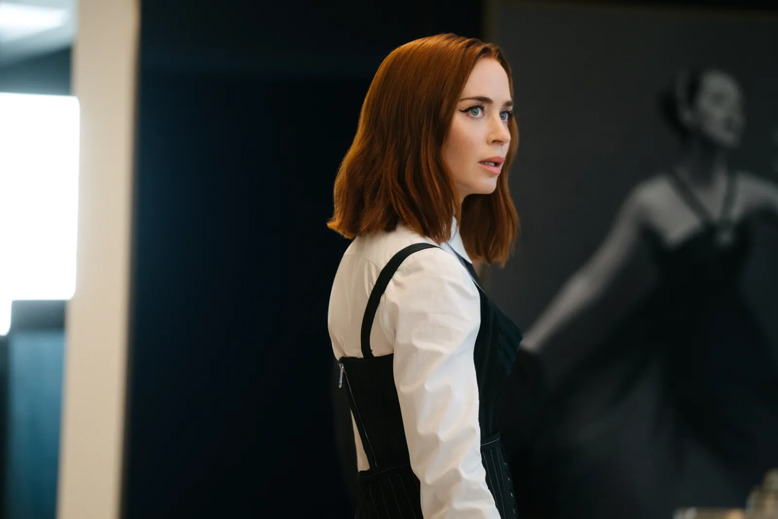 Image may contain Emily Blunt Face Head Person Photography Portrait Adult Blouse Clothing and Formal Wear
