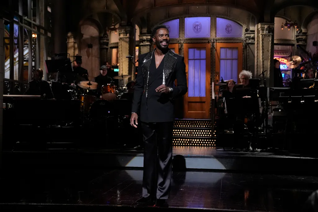 Image may contain Colman Domingo Performer Person Solo Performance Adult Standing Clothing Coat and Formal Wear