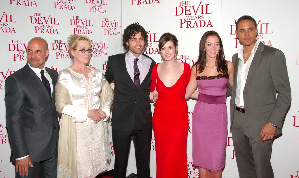 Image may contain Adrian Grenier Anne Hathaway Emily Blunt Meryl Streep Fashion Adult Person Clothing and Dress
