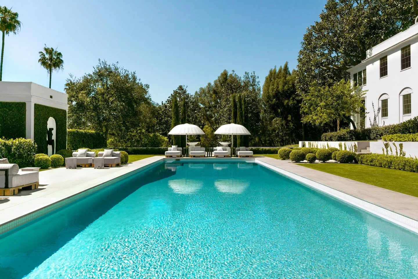 Image may contain Architecture Building House Housing Villa Pool Water Swimming Pool Outdoors Backyard and Nature