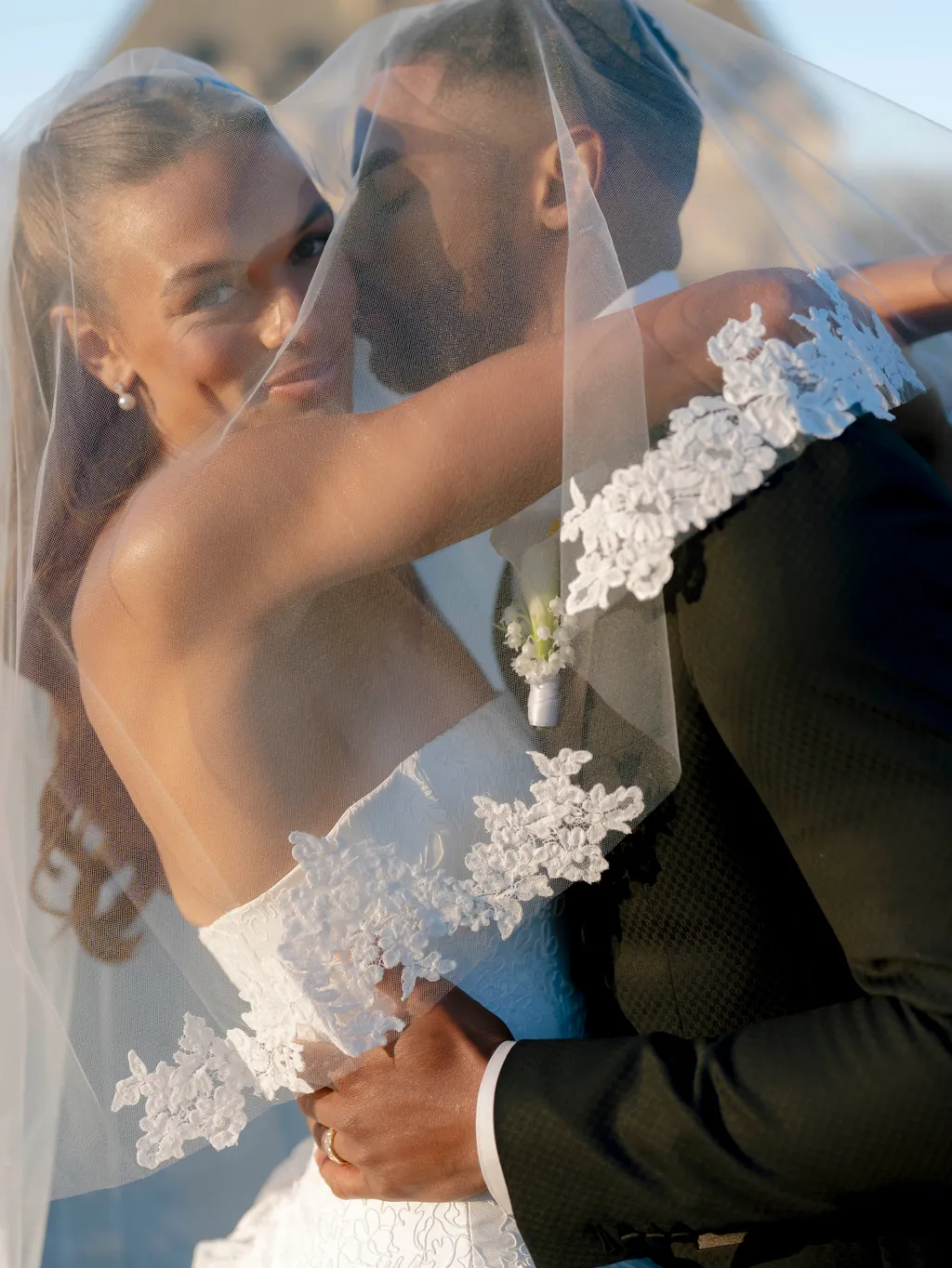 Image may contain Clothing Dress Fashion Formal Wear Gown Wedding Wedding Gown Photography Face Head and Person