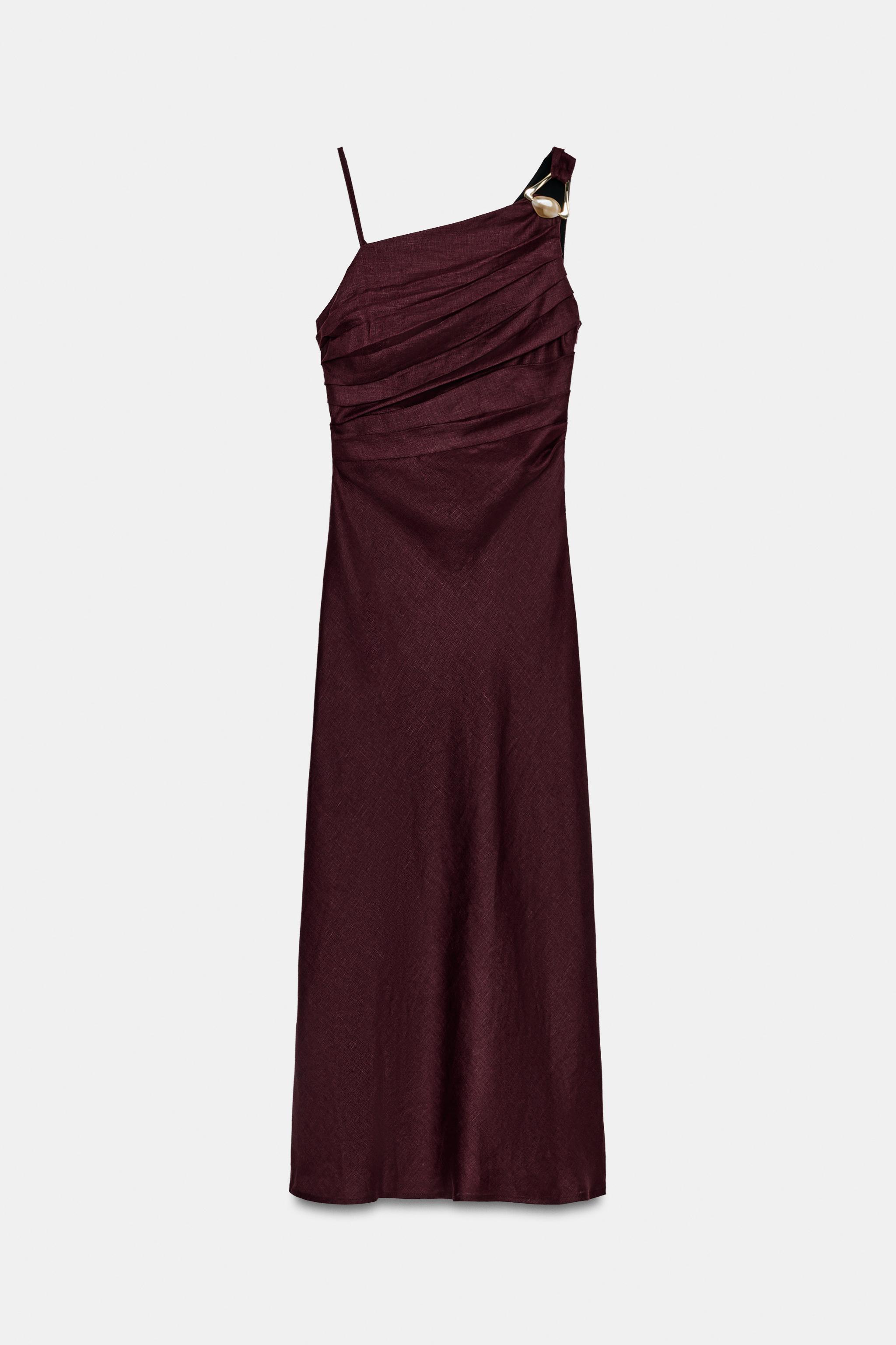 De la Feria de Abril a invitada: vestido midi asim�trico de Zara con el que lucir�s espectacular tanto en el Real de Sevilla como en bodas, bautizos y comuniones esta primavera-verano