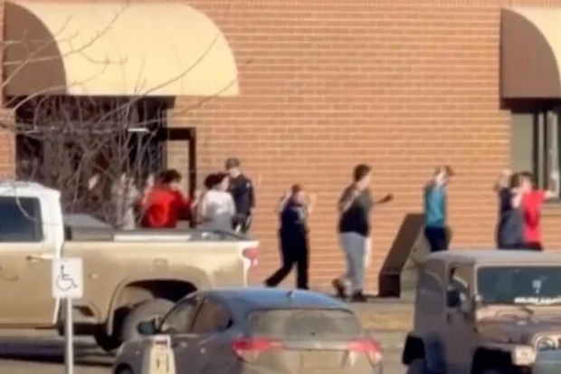 This grab from video shows students exiting the Tumbler Ridge school after deadly shootings, in British Columbia, Canada, Feb. 10, 2026. 