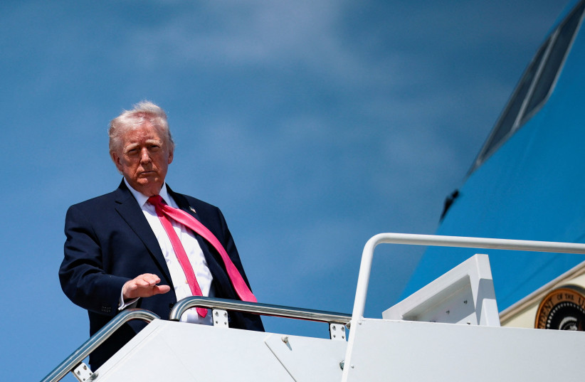 US President Donald Trump looks on as he boards Air Force One for his trip to Las Vegas, Nevada, as he departs Joint Base Andrews, Maryland, US, on the day he announced that Israeli and Lebanese leaders had agreed to begin a 10-day ceasefire, April 16, 2026.