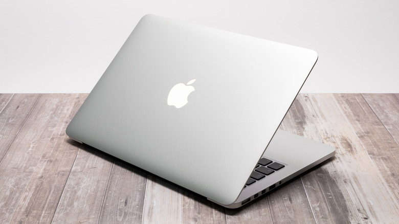The glowing Apple logo on a 2015 MacBook Pro.