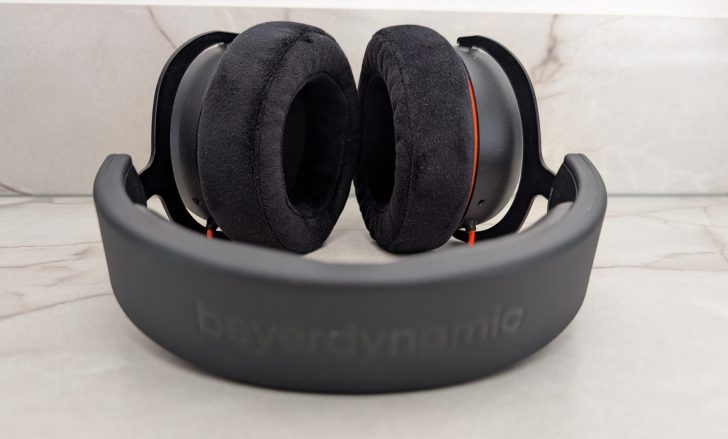 Beyerdynamic headphones with black ear cushions and a visible logo on the headband.
