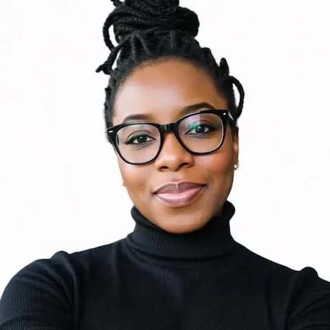 Portrait of a woman dres… with her hair tied up.