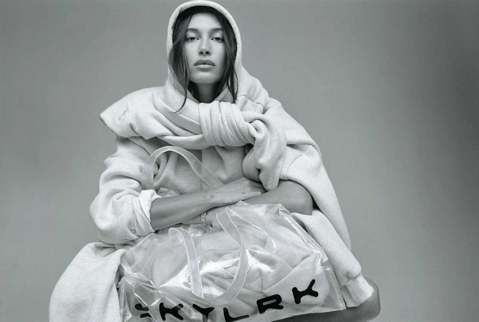 Image may contain Hailey Baldwin Face Head Person Photography Portrait Fashion Adult Blanket Accessories and Bag