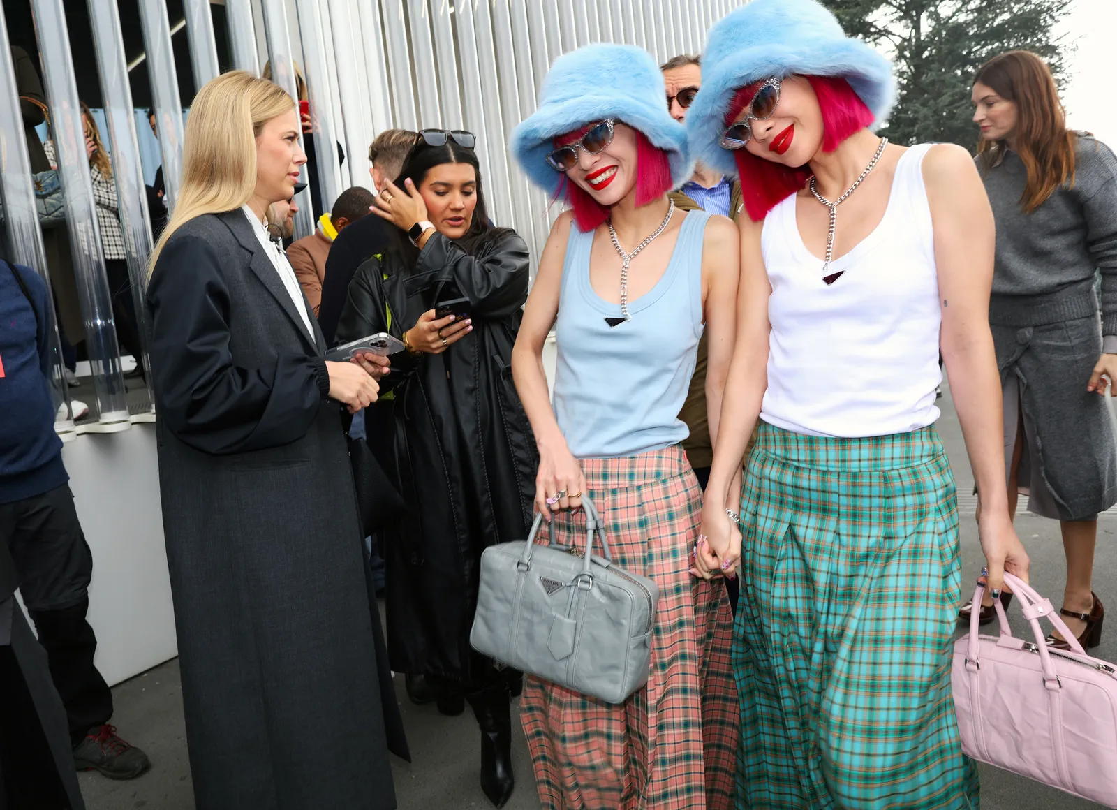 Ami and Aya wear Prada. Milan fall 2023 readytowear