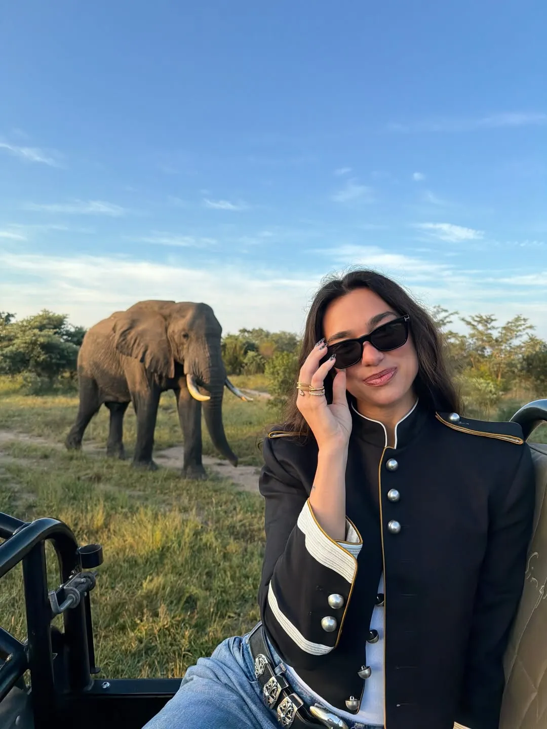 Image may contain Dua Lipa Photography Nature Outdoors Face Head Person Portrait Animal Elephant and Mammal