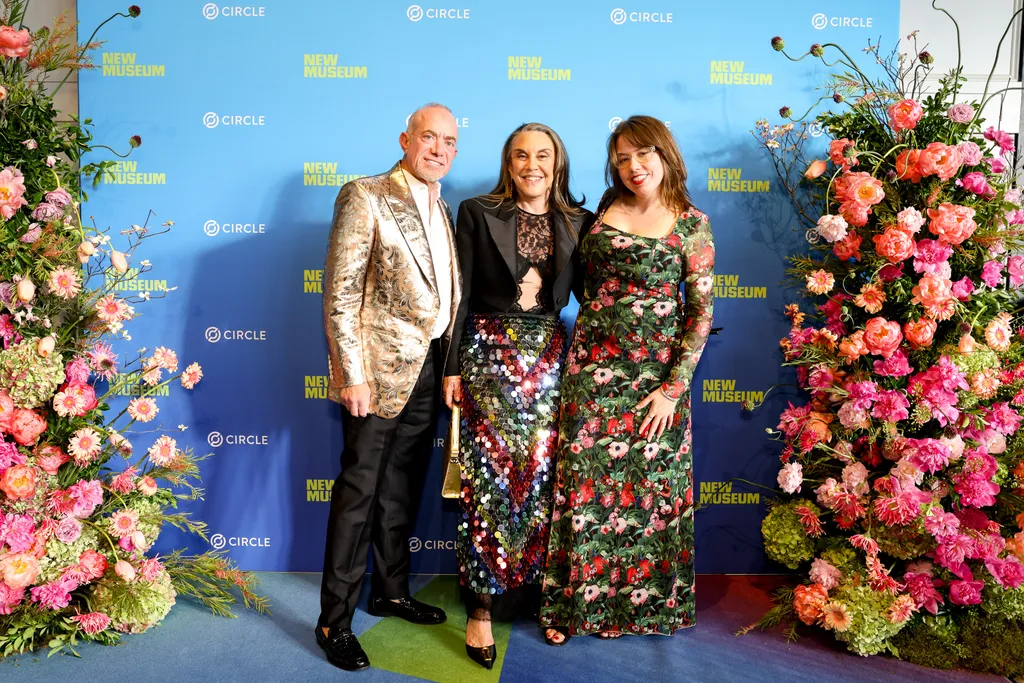 Image may contain Helena Revoredo Fashion Adult Person Clothing Coat Face Head Groupshot and Dress