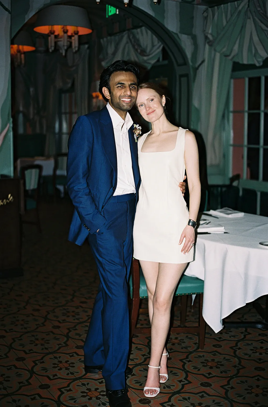 Image may contain Blazer Clothing Coat Jacket Formal Wear Suit Adult Person Dress Fashion Pants People and Face