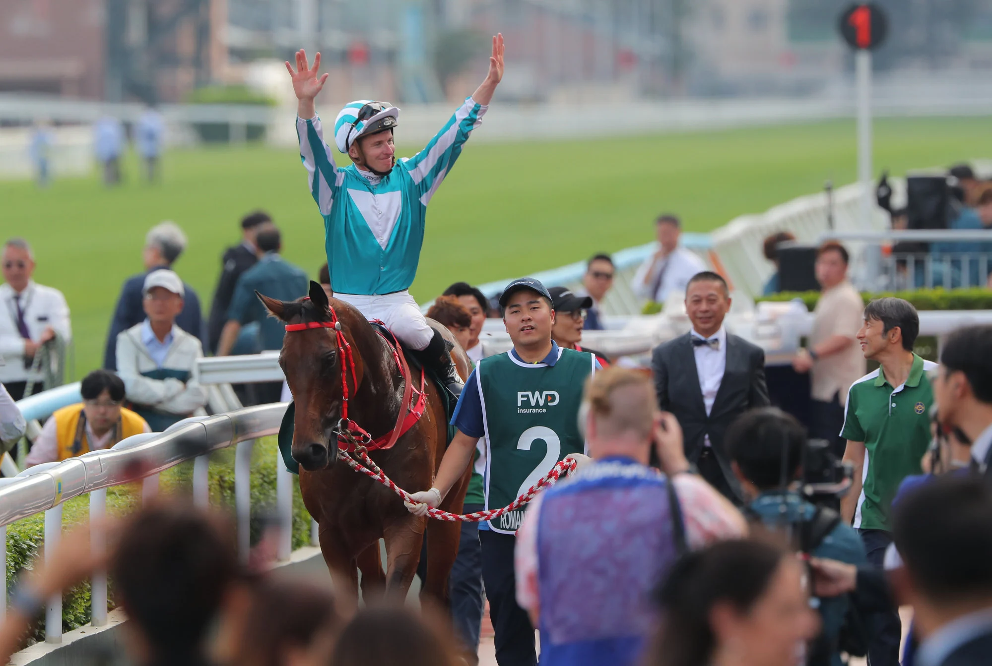 Romantic Warrior heads into the winner’s enclosure. Romantic Warrior heads into the winner’s enclosure.