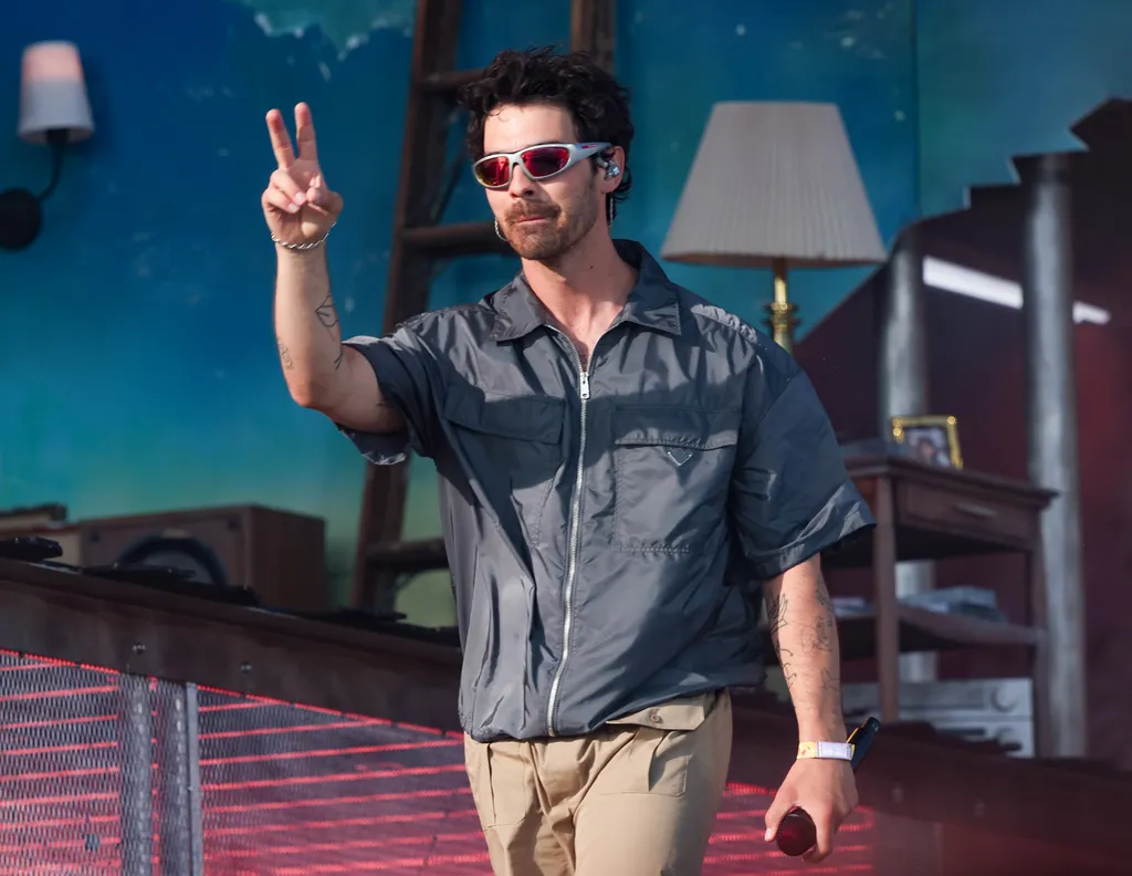 Image may contain Joe Jonas Clothing Sleeve Accessories Sunglasses Adult Person Face Head and Performer