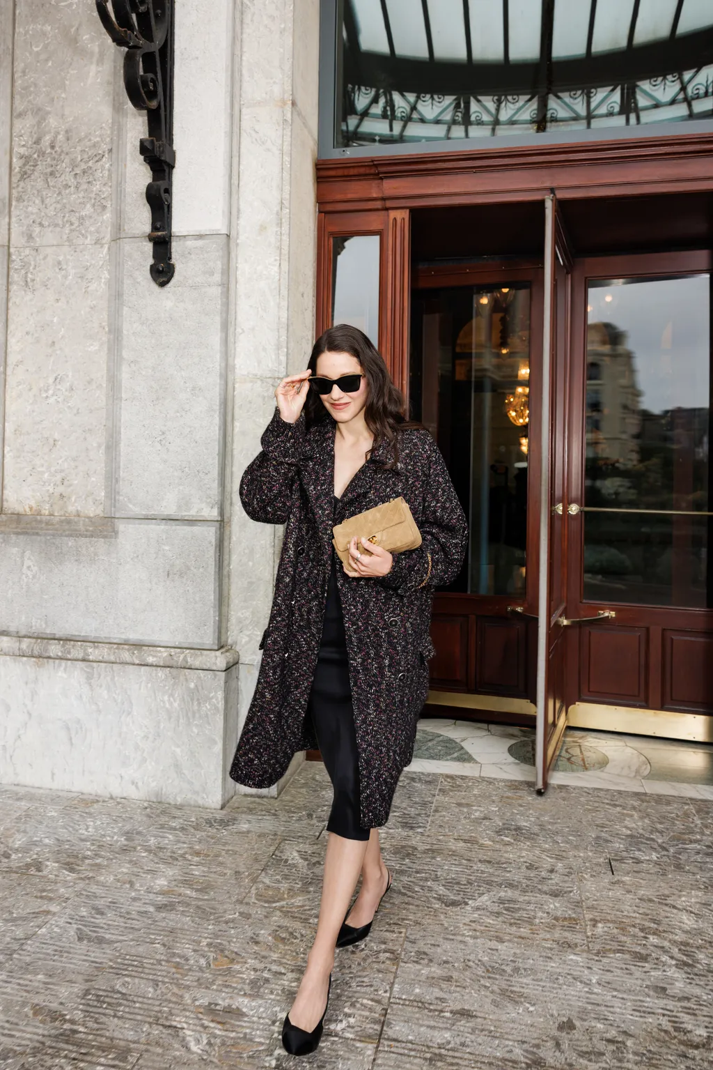 Image may contain Marion Cotillard Clothing Coat Overcoat Door and Sleeve